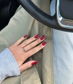 Hand with manicured nails wearing Pink Gellac 199 Luscious Red gel polish.