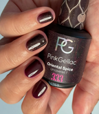 Hand with manicured nails wearing Pink Gellac 333 Oriental Spice gel polish.