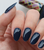 Hand with manicured nails wearing Pink Gellac 338 Classic Blue gel polish.