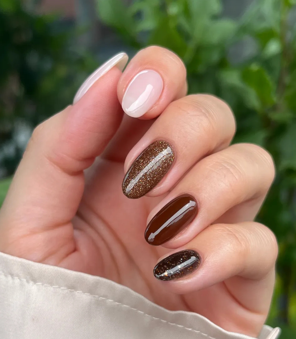 Hand with manicured nails wearing Pink Gellac 419 Marshmallow Nude gel polish.