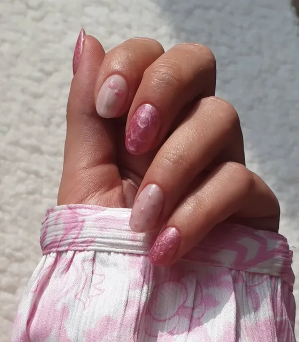 Manicured nails painted with Pink Gellac 454 Velvet Rose gel polish.