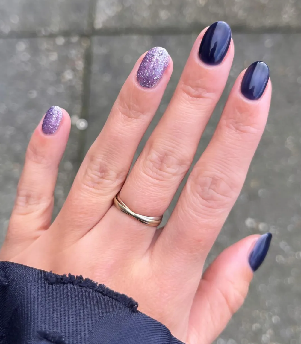 Manicured nails painted with Pink Gellac 470 Midnight Shadow gel polish.