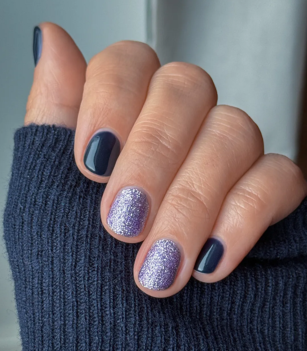 Manicured nails painted with Pink Gellac 470 Midnight Shadow gel polish.