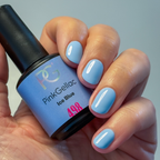 Manicured nails painted with Pink Gellac 498 Ice Blue gel polish.