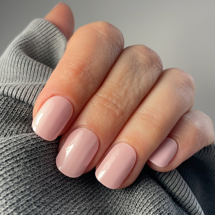 Hand wearing Pink Gellac 058 Bare Rose gel nail stickers.