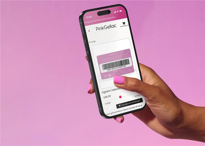 A hand holds a smartphone with a Pink Gellac digital gift card screen on it against a pink background.