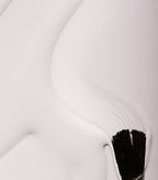 Smear of Pink Gellac 101 Soft White gel polish with a brush, showing the soft white shade.