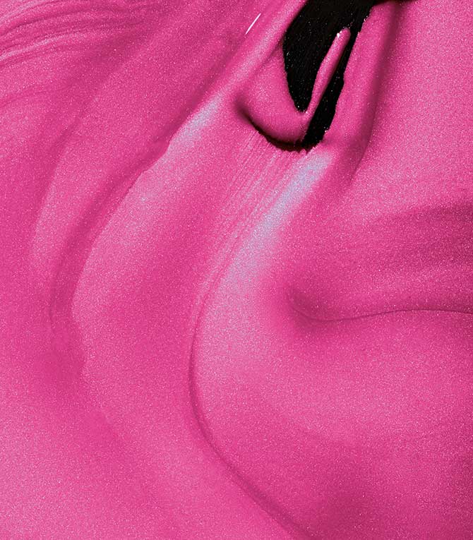 Close-up of Pink Gellac 146 Extreme Pink gel polish texture.