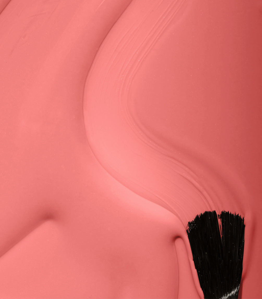 Close-up of Pink Gellac 290 Sunblaze Orange gel polish texture.