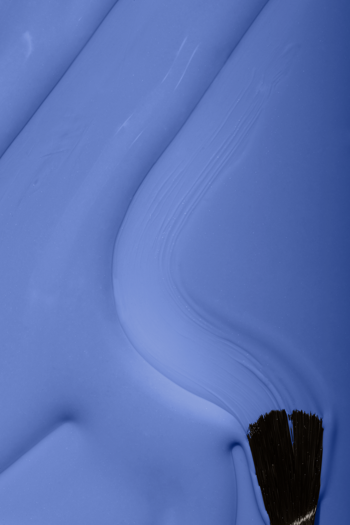 Close-up of Pink Gellac 301 Azure Blue gel polish texture.