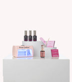 Pink Gellac Discovery gel nail polish kit with mini-size bottles, lamp and accessories.