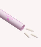 Pink pen with three interchangeable white attachments against a white background.