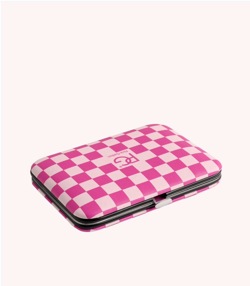 A pink-white checkered hardcase wallet with metal closure.