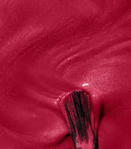 Smear of Pink Gellac 104 Passion Pink gel polish with a brush, showing the vibrant pink shade.