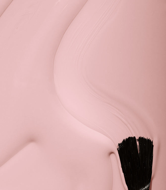 Close-up of Pink Gellac 105 Blush Orange gel polish texture.