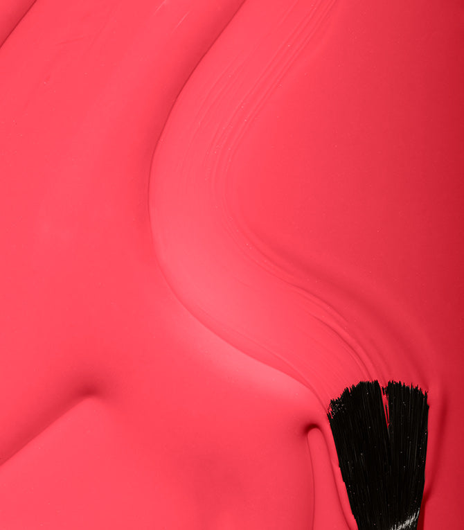 Close-up of Pink Gellac 107 Cheerfull Red gel polish texture.