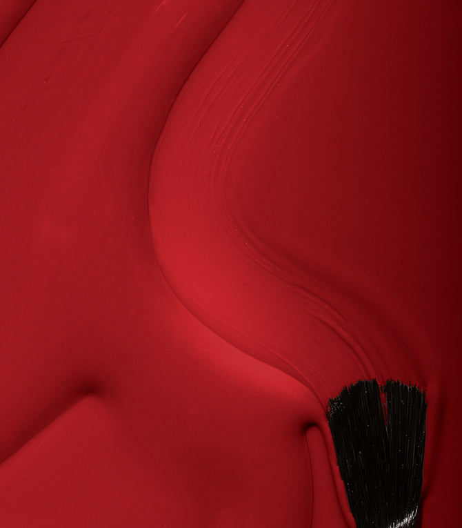 Close-up of glossy Pink Gellac 109 Lipstick Red gel polish texture.