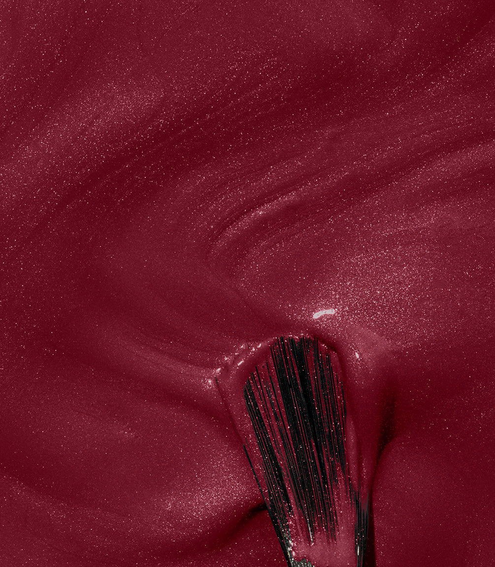 Close-up of Pink Gellac 111 Rustic Red gel polish texture.