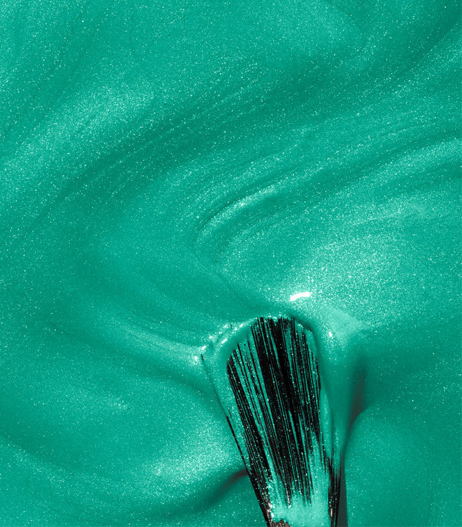 Close-up of Pink Gellac 124 Caribbean Blue gel polish texture.