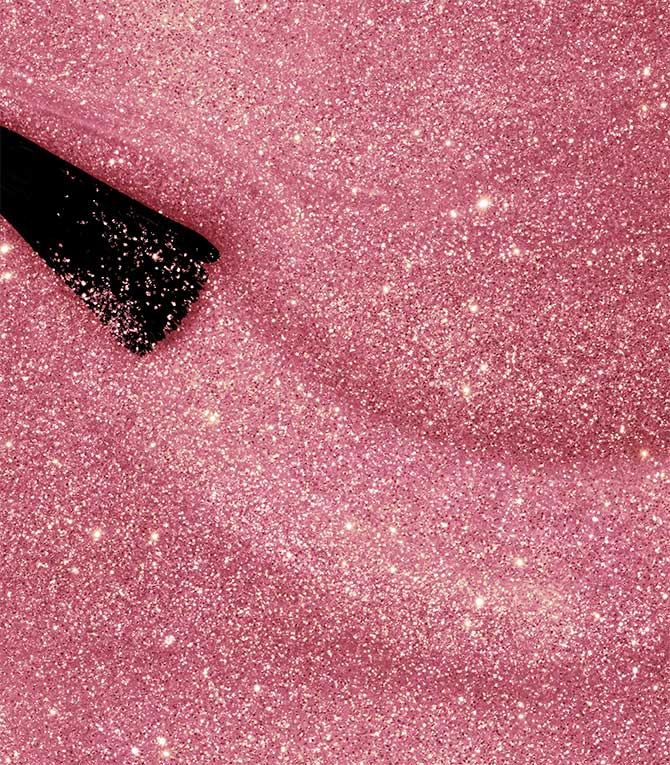Close-up of Pink Gellac 141 Glitter Pink gel polish texture.