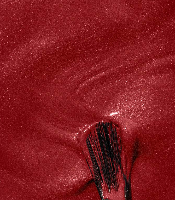 Close-up of Pink Gellac 149 Moulin Red gel polish texture.