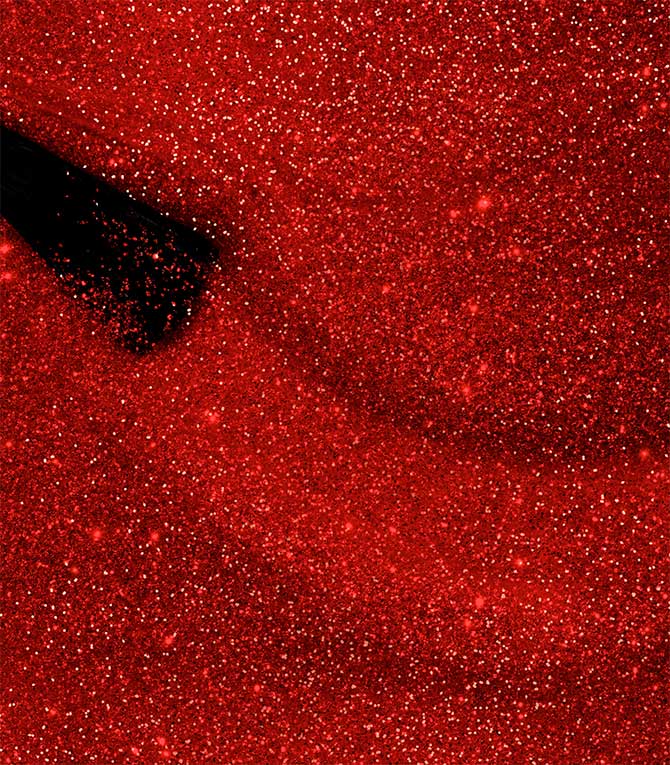 Close-up of Pink Gellac 178 Ultimate Red gel polish texture.