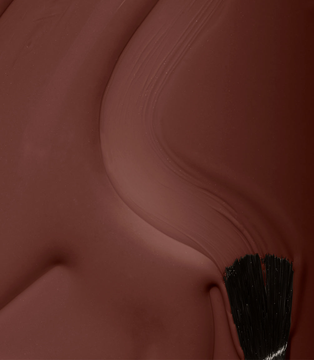 Close-up of Pink Gellac 203 Chocolate Brown gel polish texture.