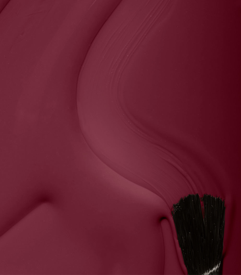 Close-up of Pink Gellac 307 Maroon Purple gel polish texture.