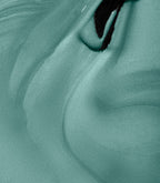 Close-up of Pink Gellac 310 Tempting Teal gel polish texture.