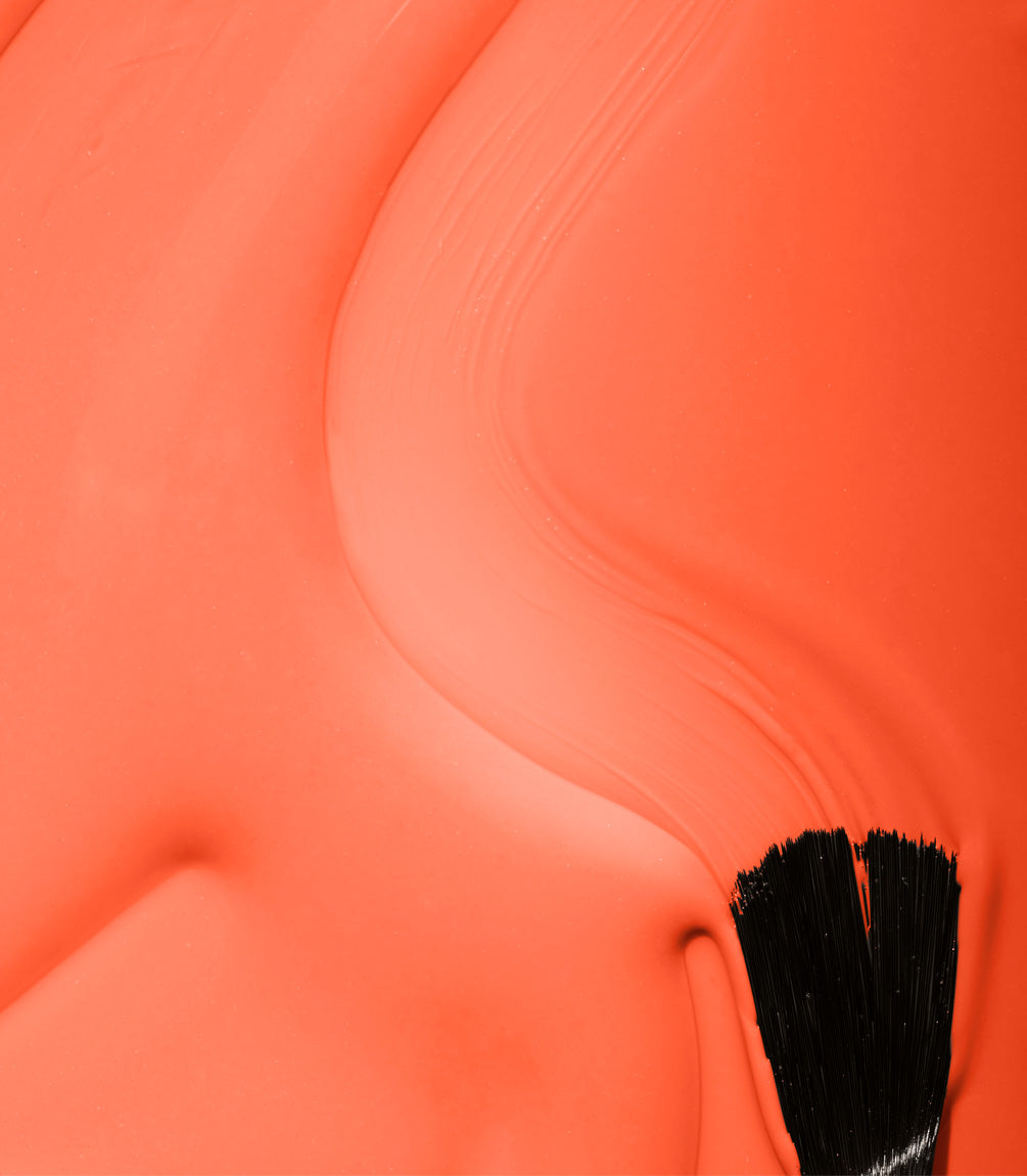 Close-up of Pink Gellac 327 Mandarin Orange gel polish texture.