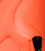 Close-up of Pink Gellac 327 Mandarin Orange gel polish texture.