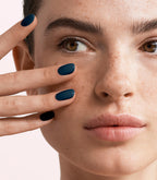 Manicured nails painted with Pink Gellac 470 Midnight Shadow gel polish.