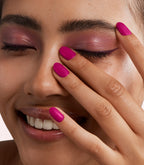 Manicured nails painted with Pink Gellac 473 Candied Cherry gel polish.