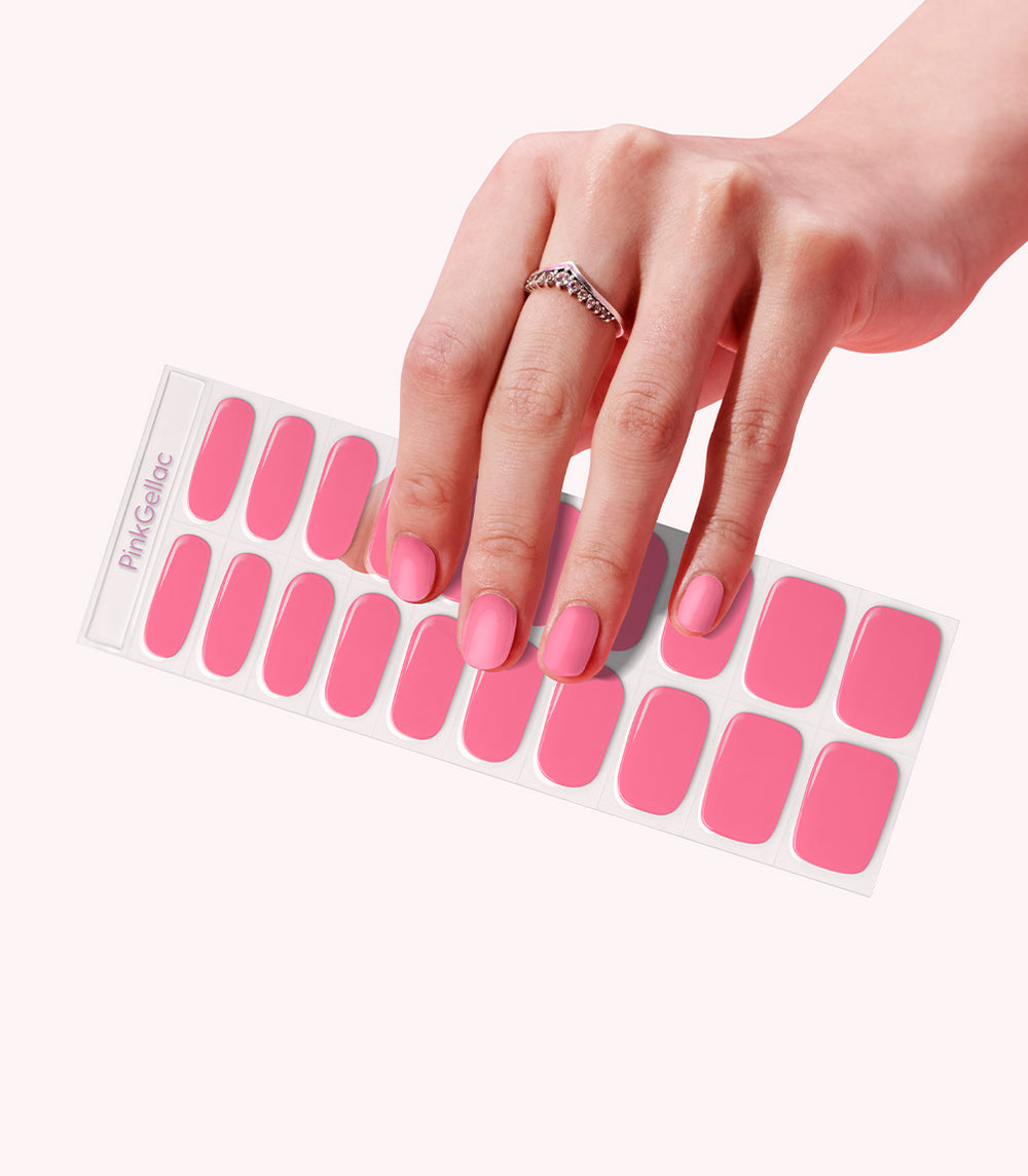 Hand wearing Pink Gellac 005 Coral Charm gel nail stickers.