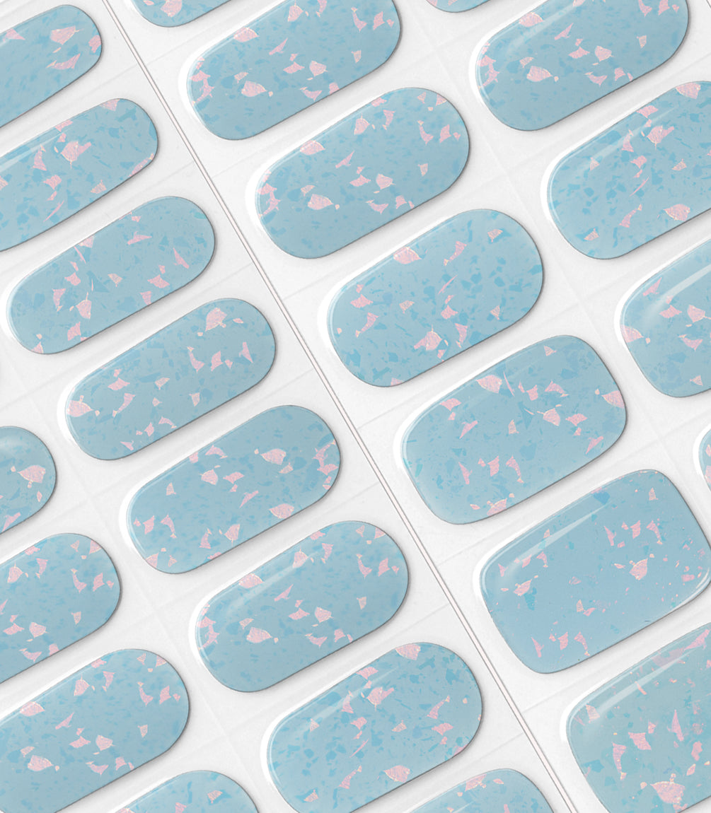 Close-up of the Pink Gellac 009 Holographic Blue gel nail sticker sheet.