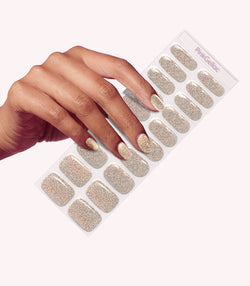 Hand wearing Pink Gellac 016 Champagne Sparkle gel nail stickers.