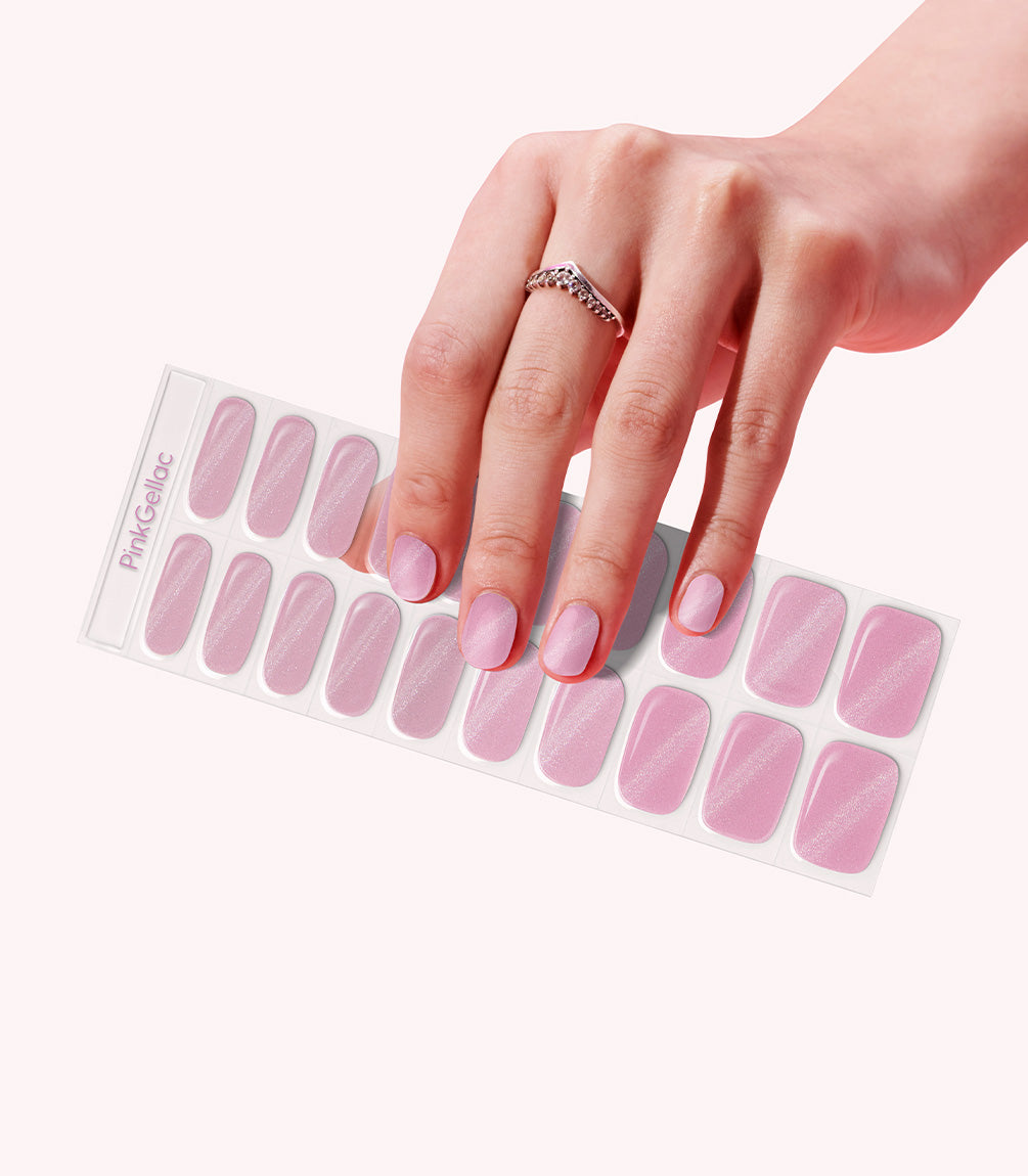 Hand wearing Pink Gellac 018 Cat Eye Blushing Pink gel nail stickers.