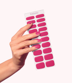 Hand wearing Pink Gellac 023 Rosy Red gel nail stickers.