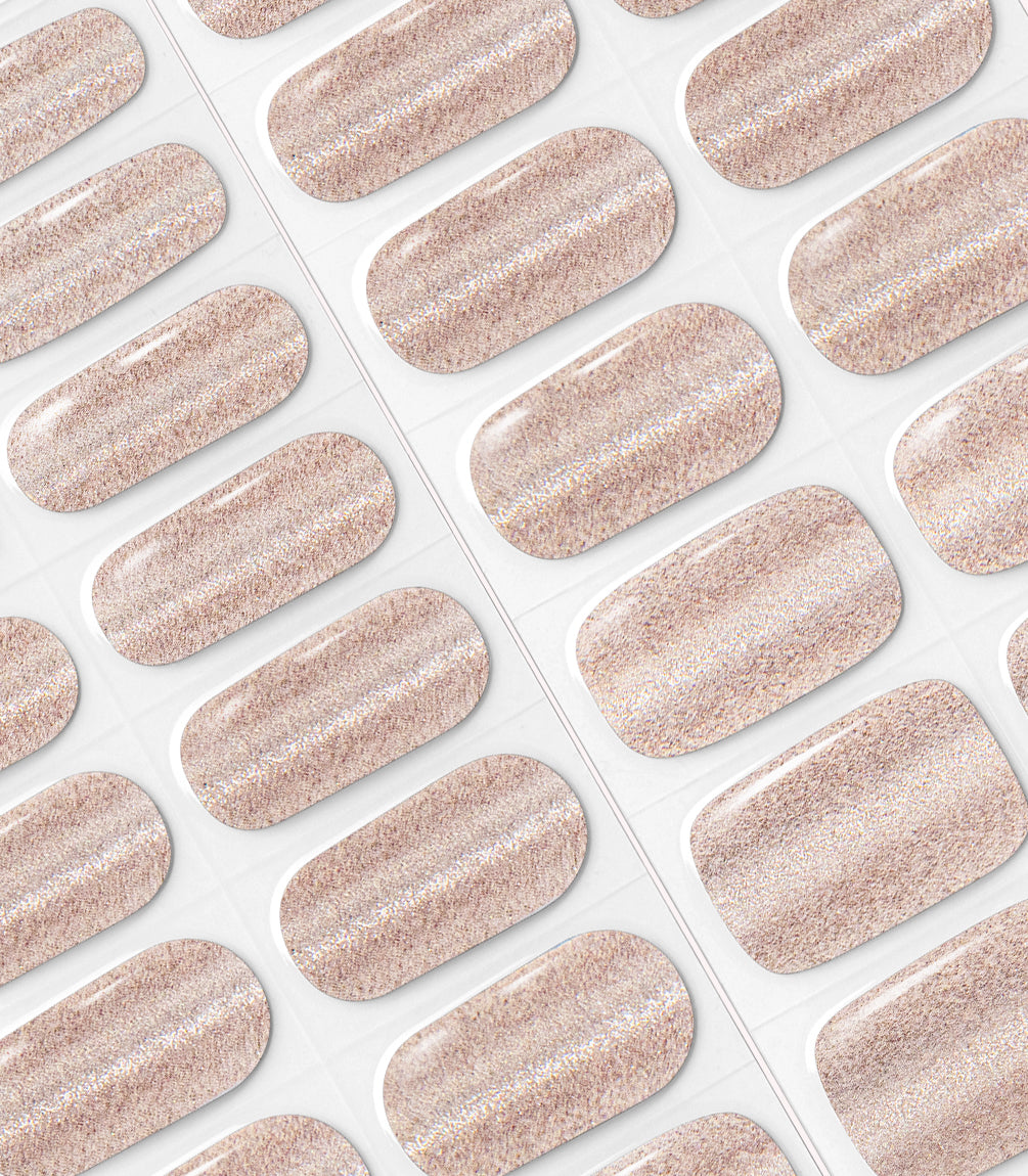 Close-up of the Pink Gellac 025 Cat Eye Champagne Gold gel nail sticker sheet.