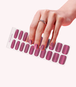 Hand wearing Pink Gellac 027 Cat Eye Flamenco Red gel nail stickers.