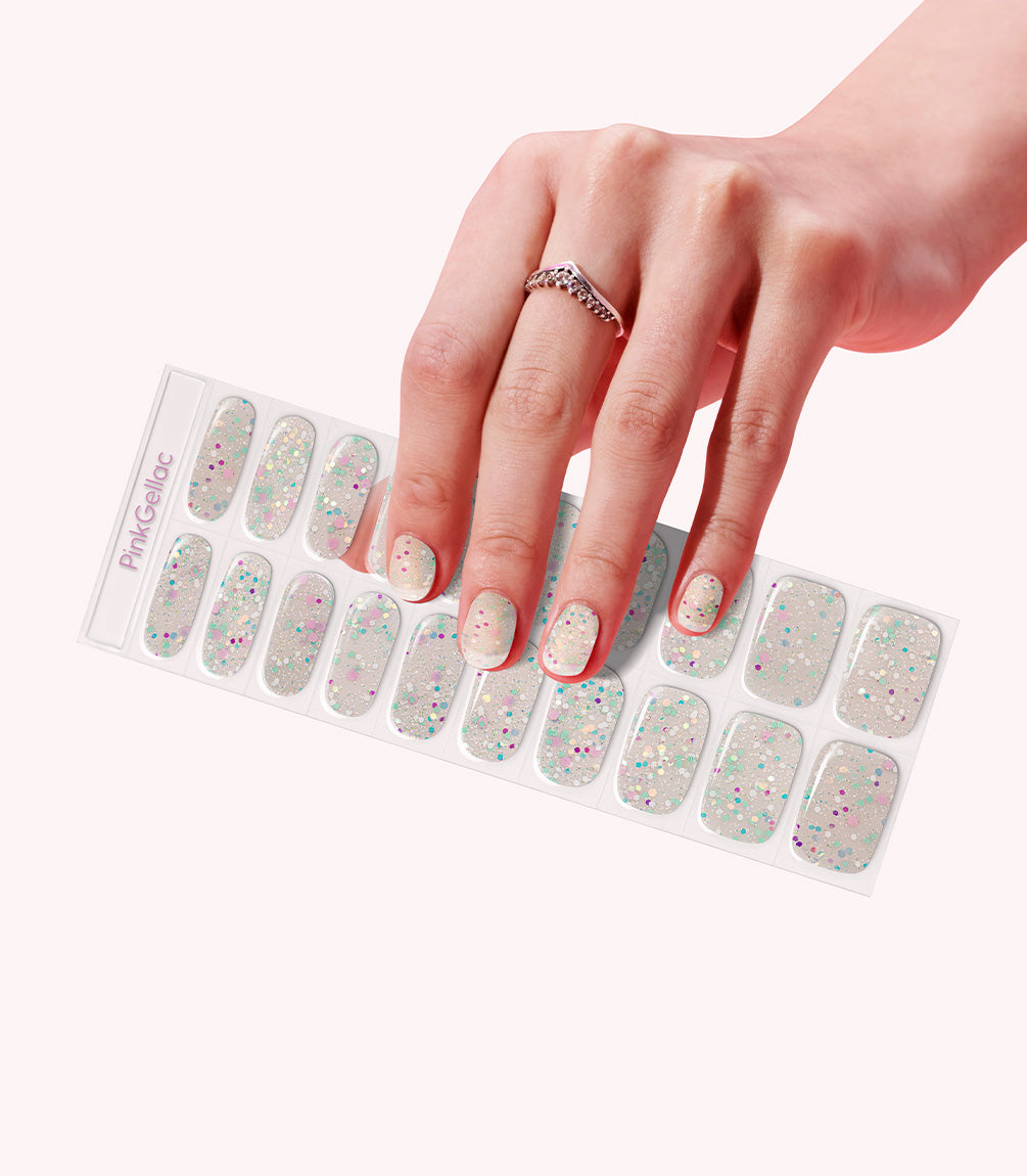 Hand wearing Pink Gellac 030 Confetti Crush gel nail stickers.