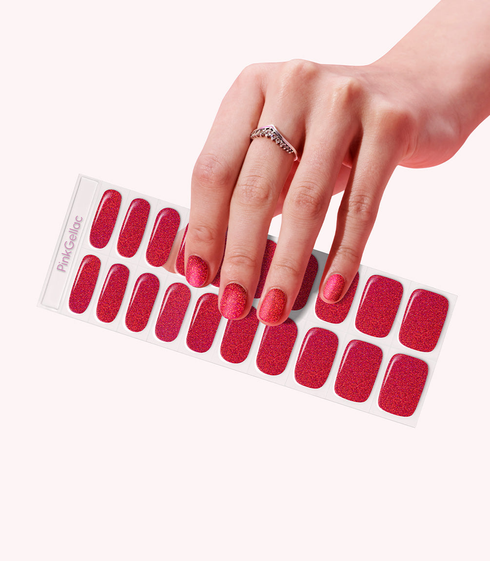Hand wearing Pink Gellac 036 Sparkling Cherry gel nail stickers.
