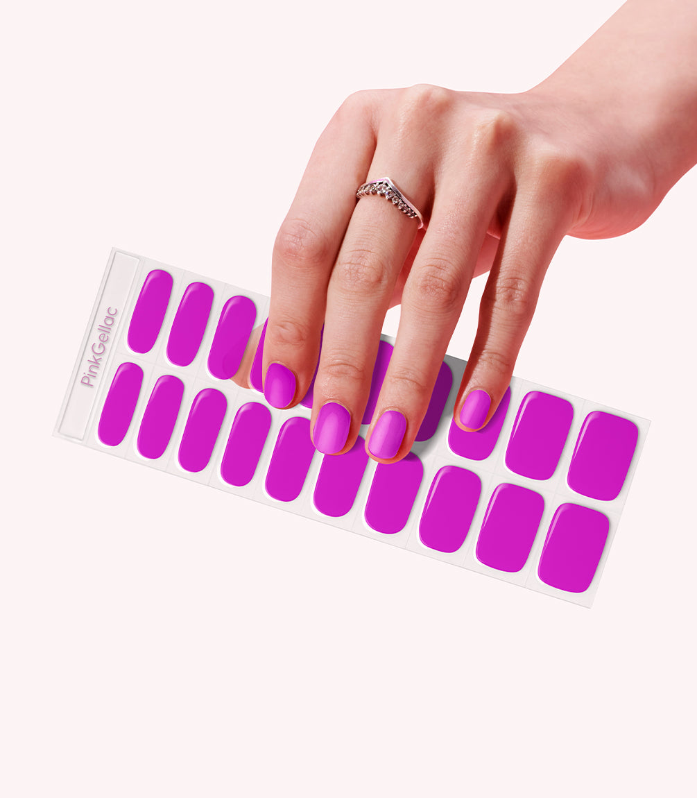 Hand wearing Pink Gellac 042 Vivid Violet gel nail stickers.