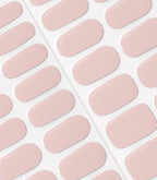 Image of pink oval nail stickers neatly arranged on a sheet.