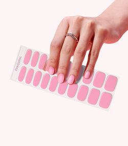 Hand wearing Pink Gellac 045 Poppy Pink gel nail stickers.