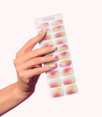 Hand wearing Pink Gellac 047 Soft Sunset gel nail stickers.