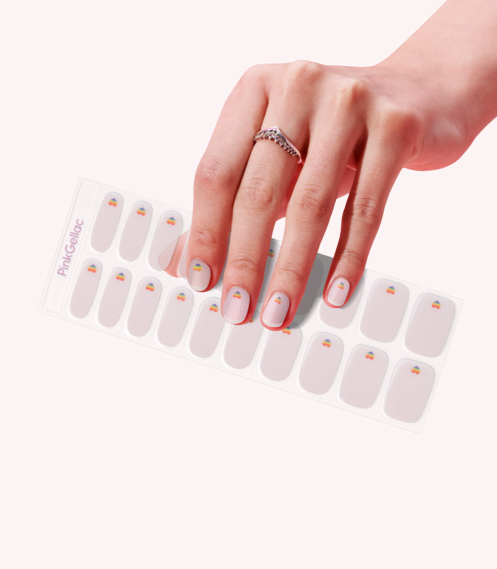 Hand wearing Pink Gellac 053 Chromatic Love gel nail stickers.