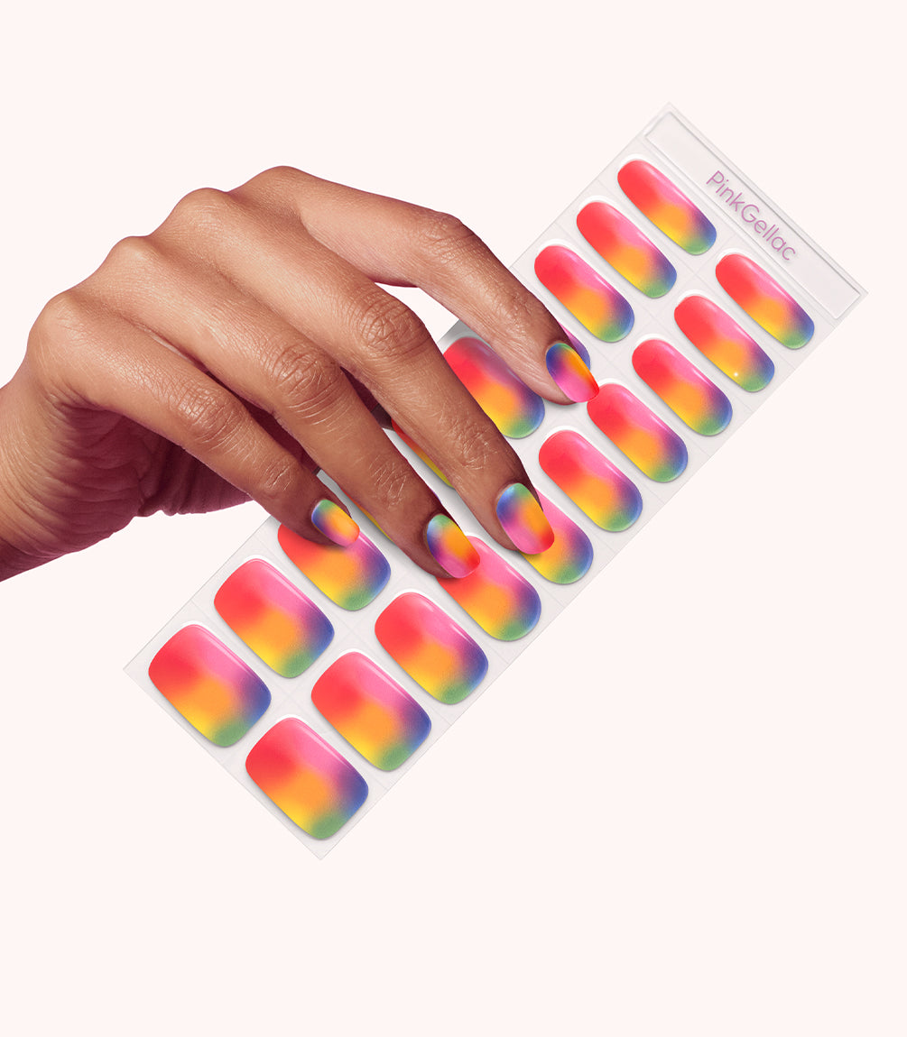 Hand wearing Pink Gellac 054 Rainbow Flow gel nail stickers.