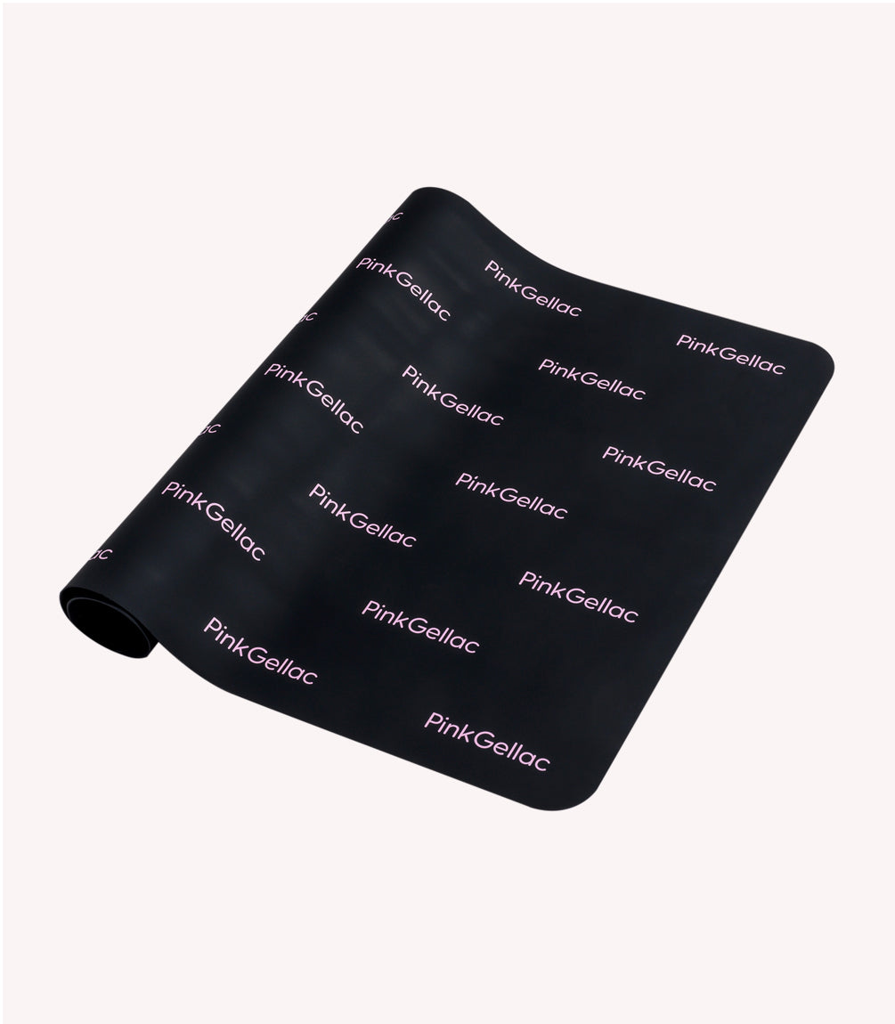 Black silicone mat with white text "Pink Gellac" in repeating pattern.