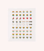 A sheet of stickers with various rainbow themes, including rainbows, hearts, eyes and the word "love".